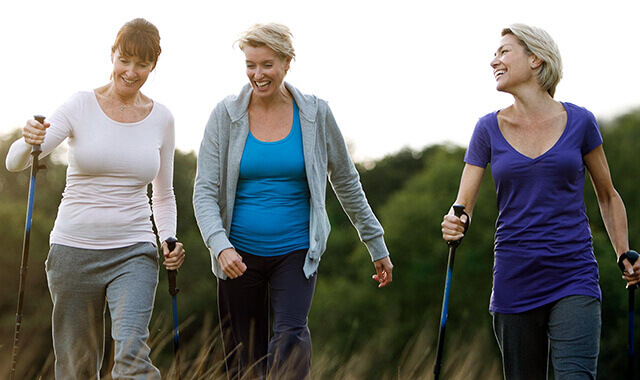 a womens walking group talking with their dentures in 